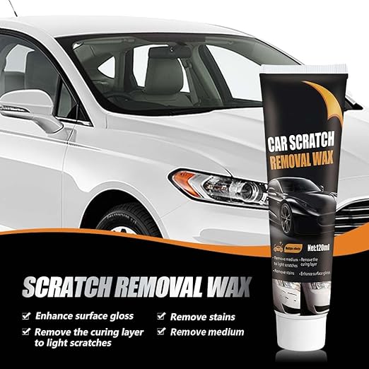 Car scratch wax being applied on a door mark