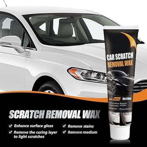 Car scratch wax being applied on a door mark